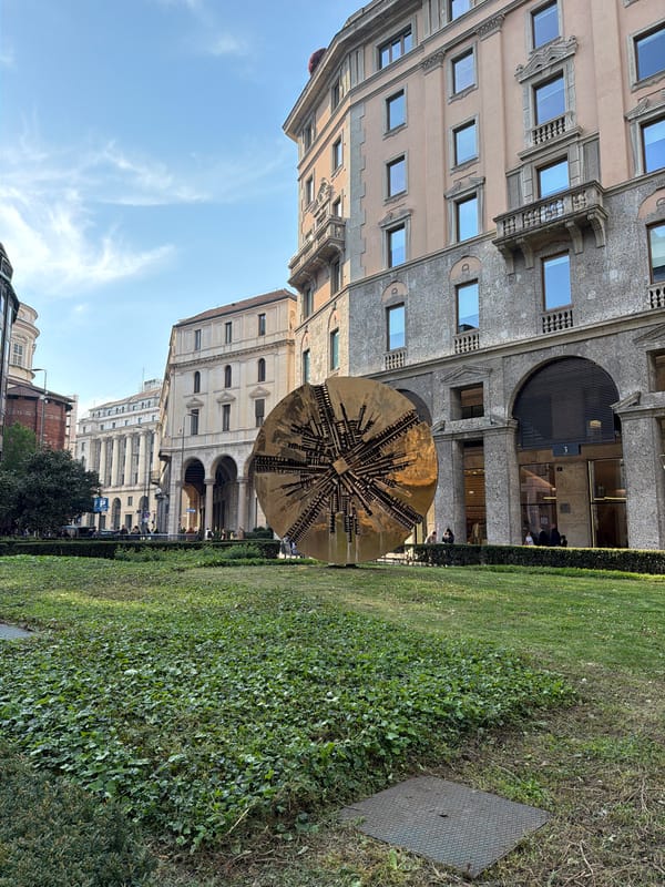Witness documents Milan architectural landmarks during afternoon walking tour