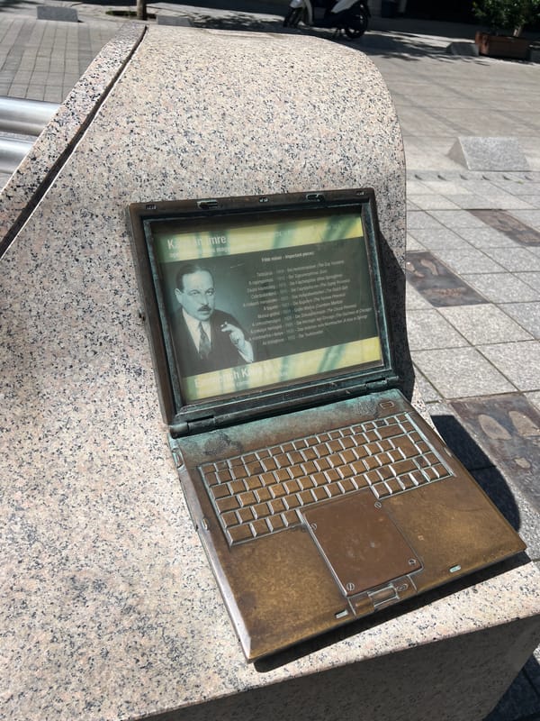 Bronze laptop memorial sculpture spotted on Budapest street