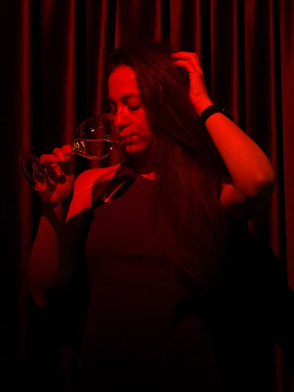 Woman relaxes with wine in atmospheric Moscow venue