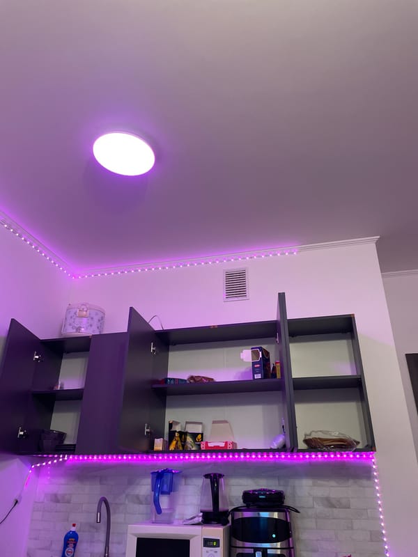 Purple LED lighting observed in Russian kitchen late night