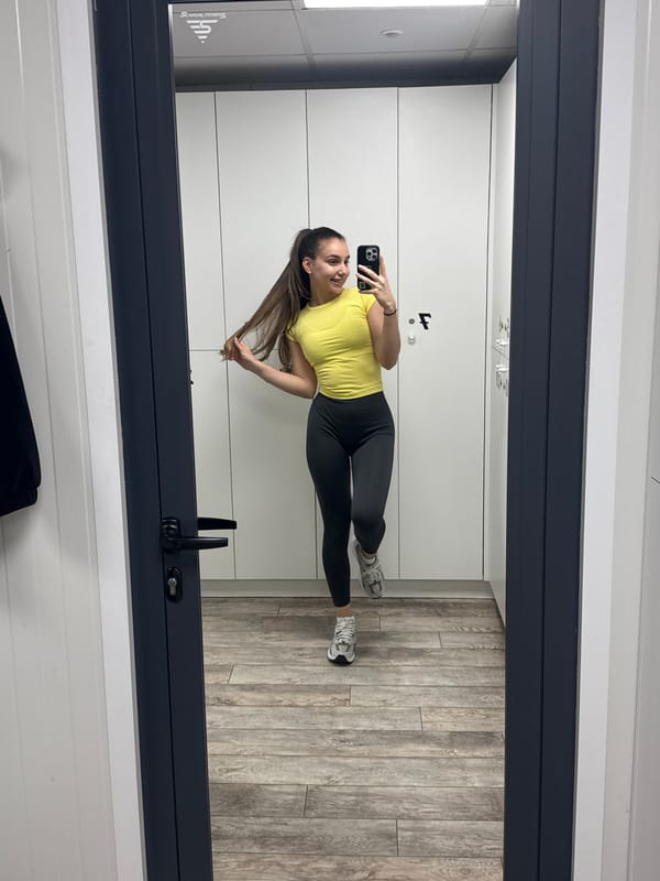 Woman photographed in changing room, later on floor in Pernik