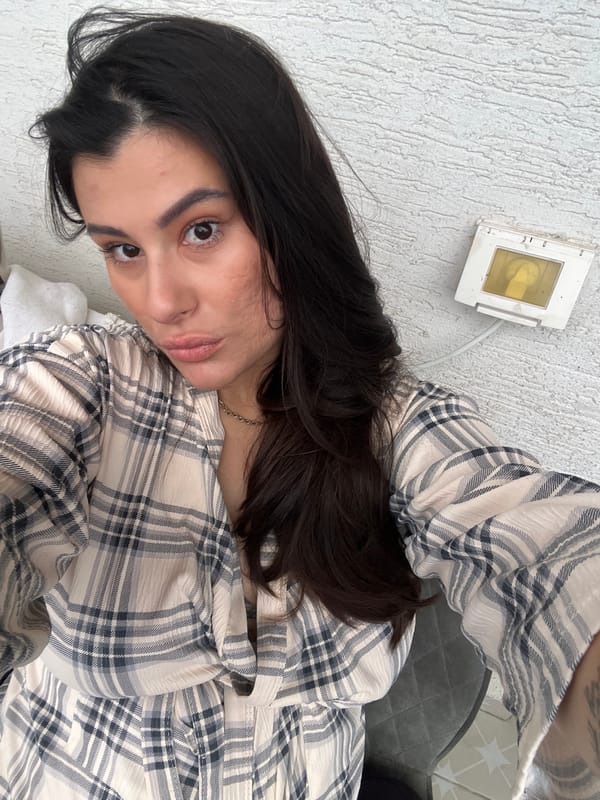 Woman photographed in plaid shirt at Kiryat Bialik residence