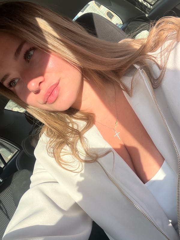 Woman photographs herself amid plant foraging activity in Budva