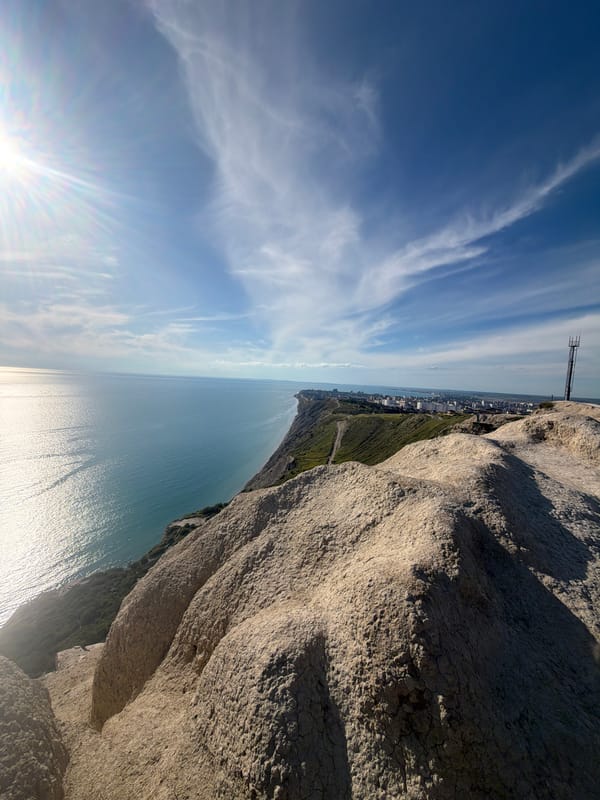 Tourist group explores Black Sea cliffs near Supsekh, Russia