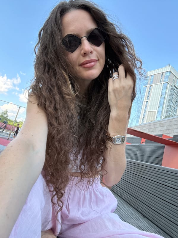 Selfie moment in Moscow with urban architecture behind