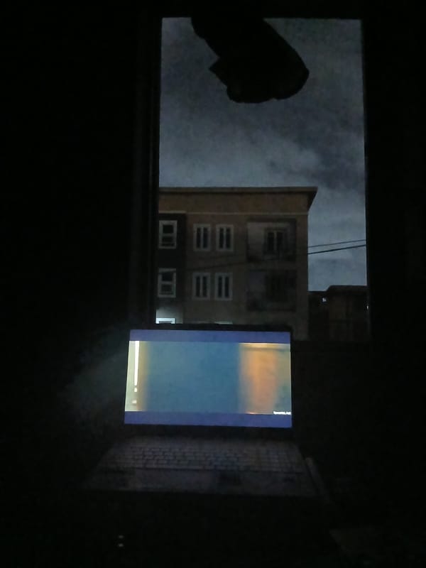 Late night film viewing session captured in Lagos