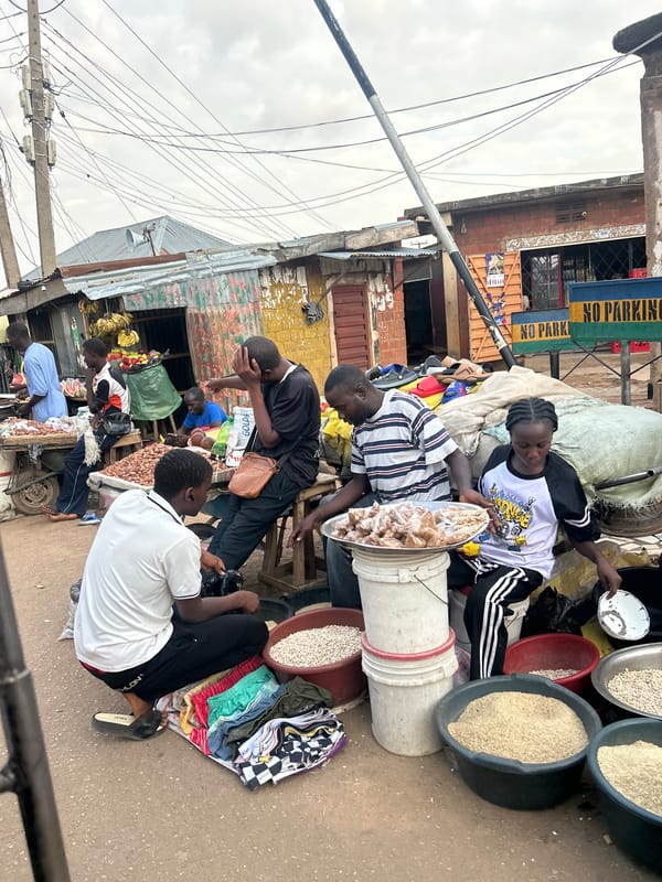 Young peanut vendors operate at Jos, Nigeria market