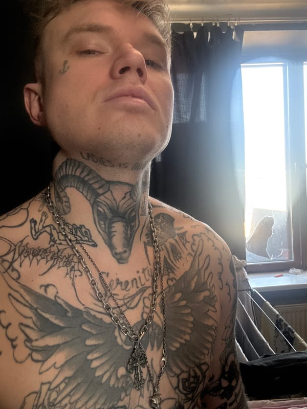 Tattooed man observed resting in Moscow