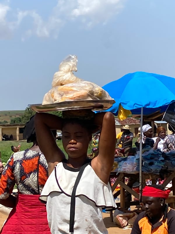 Daily life unfolds in Riyom Nigeria marketplace