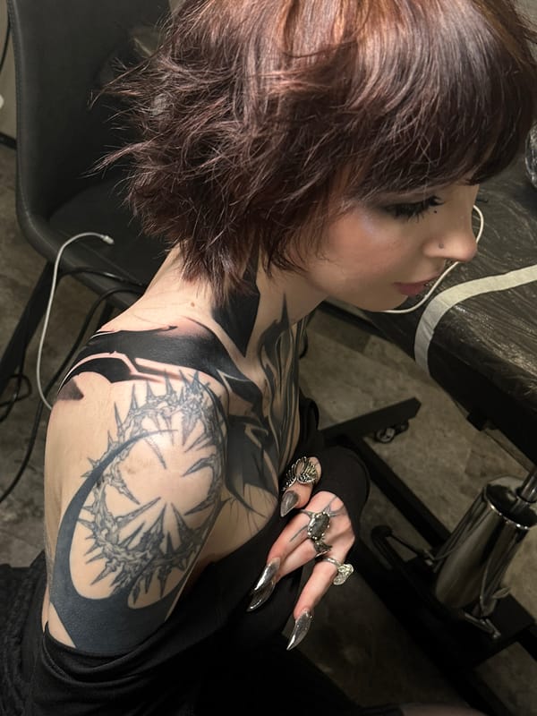 Tattoo session documented at Moscow studio
