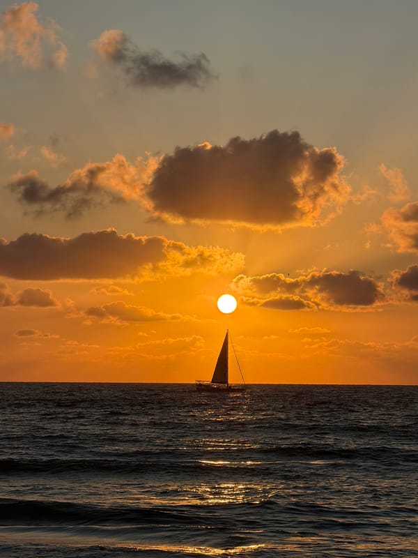 Sunset sailboat photographed off Tel-Aviv Mediterranean coast