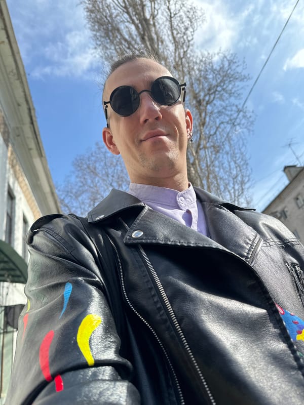 Man in painted leather jacket photographed outdoors in Saratov