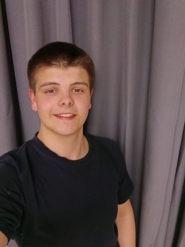 Young man documents indoor photo session in Andreyevo, Russia