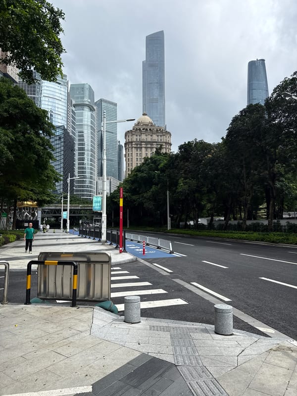 Street-level tour through Guangzhou's Tianhe CBD on a cloudy morning