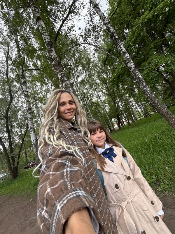 Two women photographed in birch forest near Rusanovo, Russia