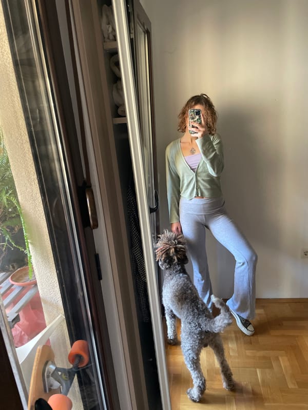 Montenegro resident documents morning routine with pets, distinctive red hat