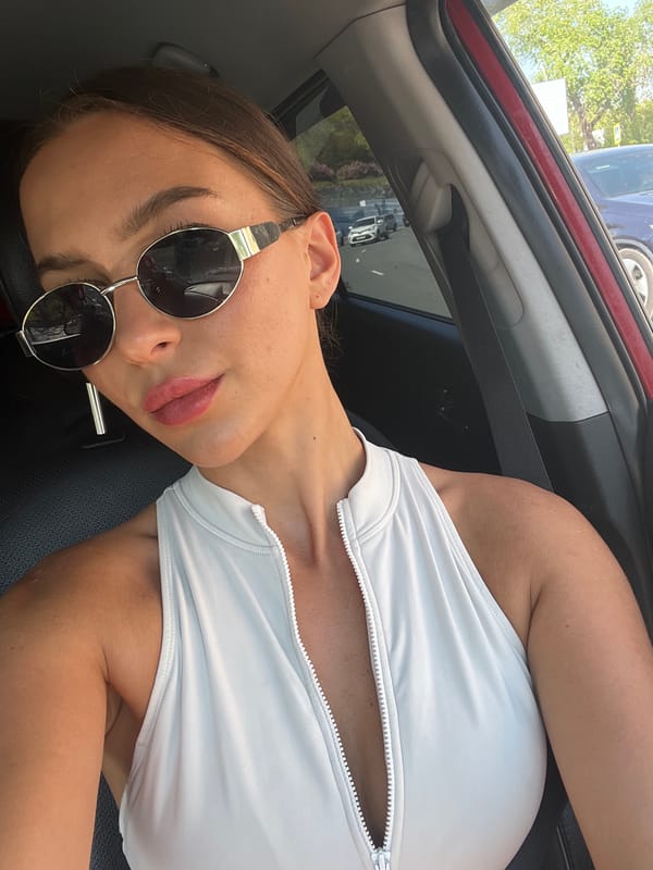 Woman in sunglasses observed in passenger seat, Vladivostok