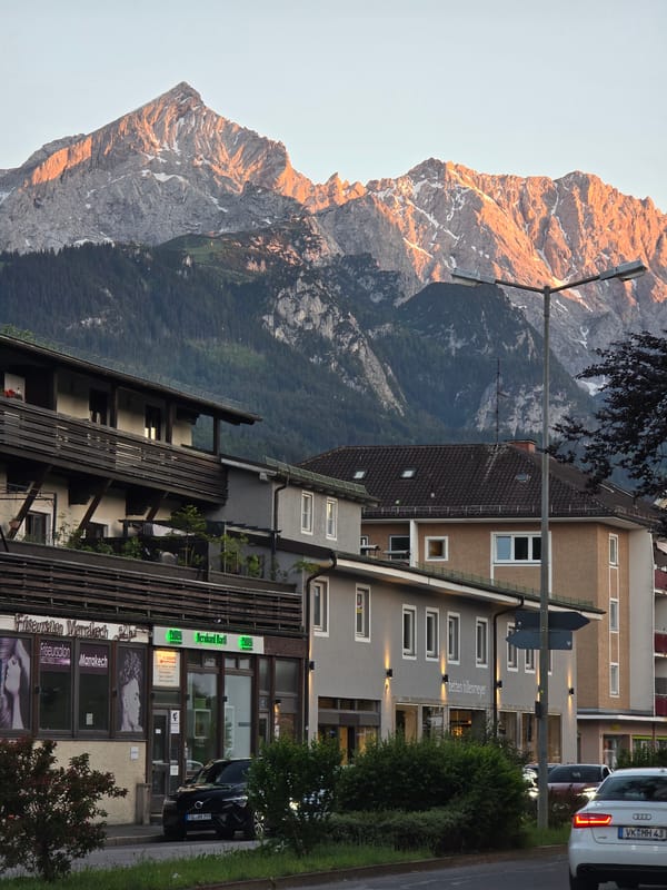 Golden hour views of Zugspitze and Bavarian streets