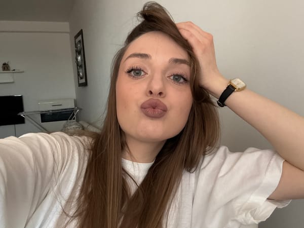 Woman takes selfies indoors in Kragujevac, Serbia