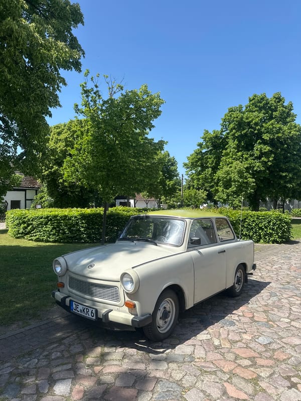 Vintage Trabant car spotted on cobblestone streets in German town