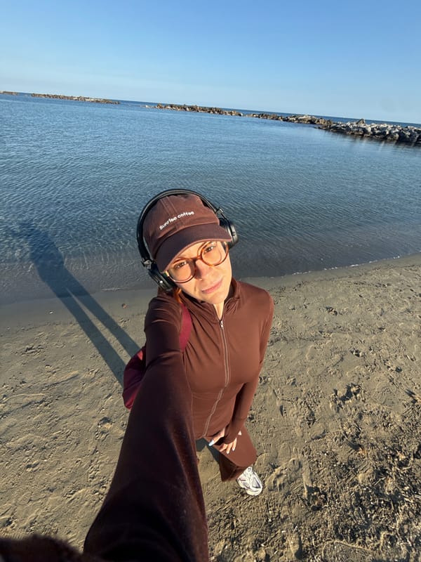 Visitor documents leisurely beach afternoon in Sanremo, Italy