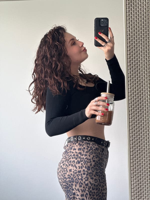 Woman documents evening selfie session in Mexico City apartment