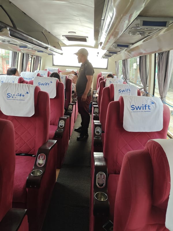 Bus interior and street-level moment in Kathmandu