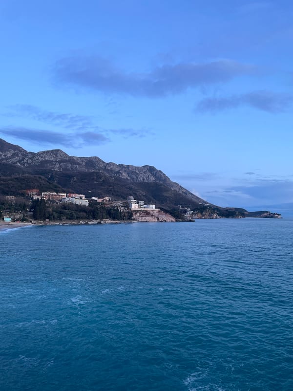 Twilight coastal documentation along Montenegro's Adriatic cliffs and tunnels