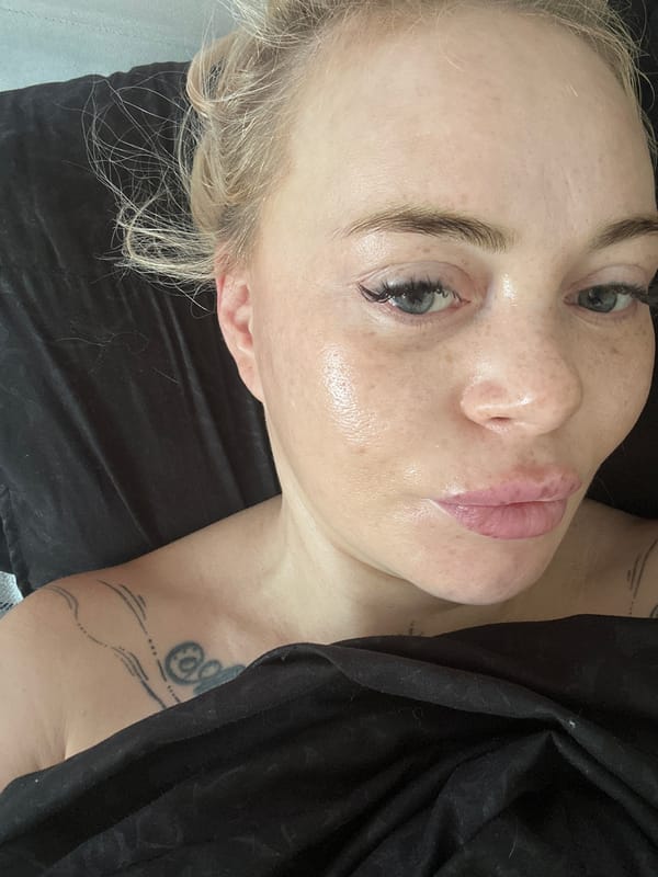 Woman photographed in intimate close-up portraits while resting