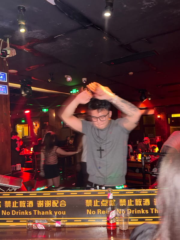DJ performs at Meow Bar nightclub in Liangjiang, China