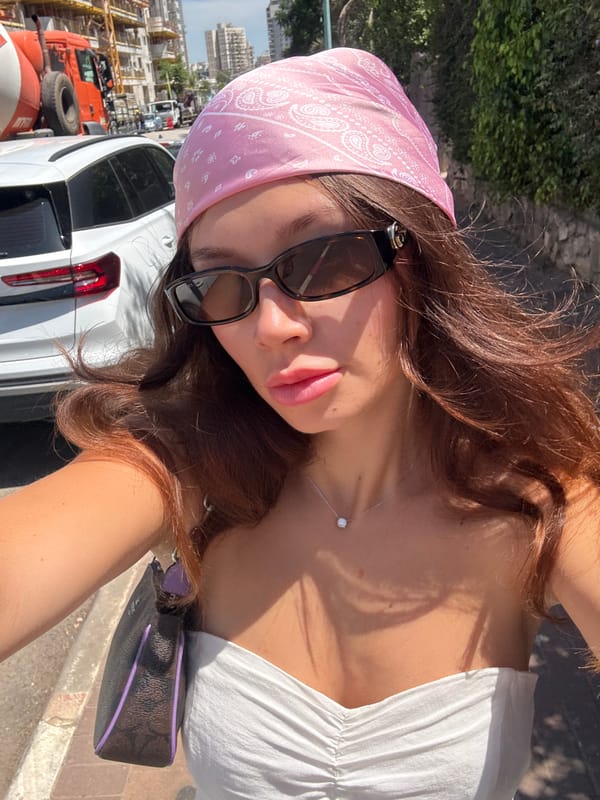 Woman takes tilted selfie in daylight in Petah Tikva
