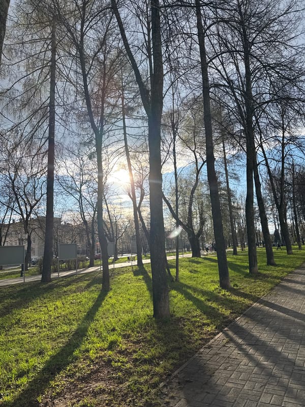 Mother and child enjoy spring afternoon in Chaikovsky park