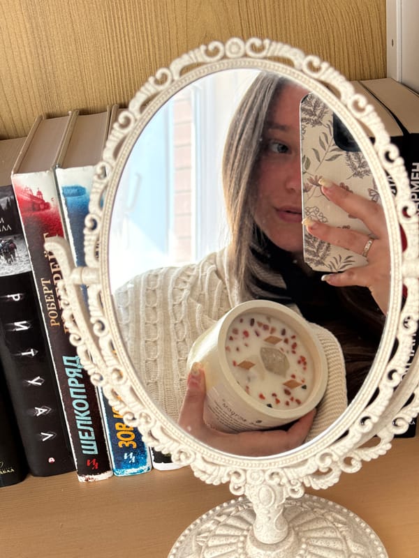 Mirror selfie with decorative candle captured in Krasnodar, Russia