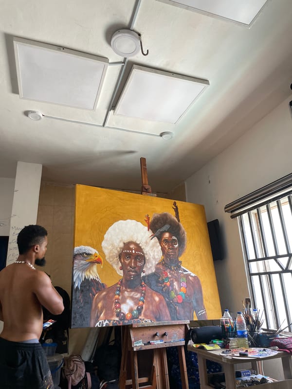 Artist creates tribal portrait painting in Ado studio