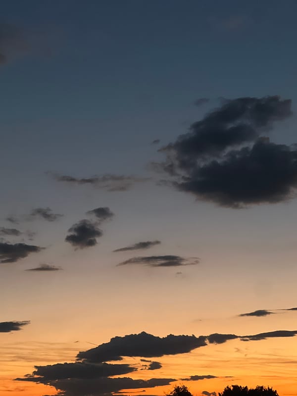 Dramatic sunset with dark clouds over Plovdiv, Bulgaria