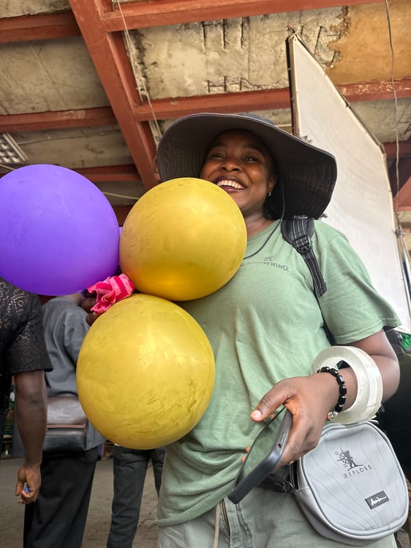 Film production crew documents equipment setup across Lagos locations