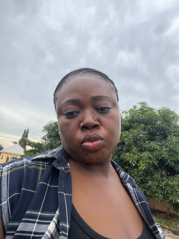 Quick selfie session in an Abuja residential neighborhood