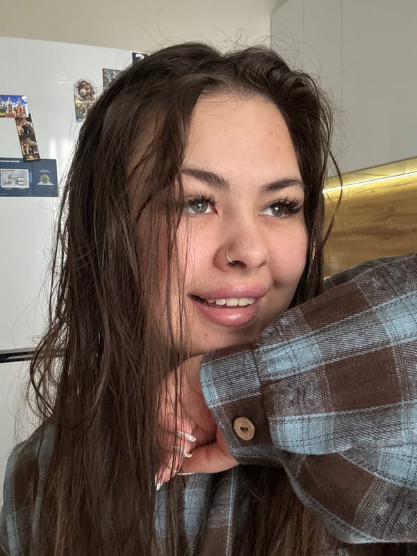 Woman documents quiet afternoon with selfies, meal near St. Petersburg
