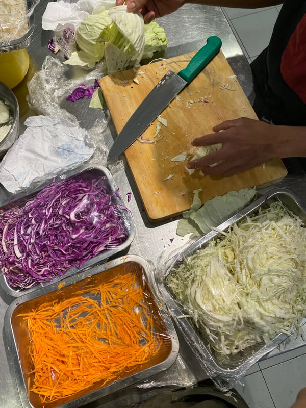 Morning food prep documented at Bandung restaurant kitchen
