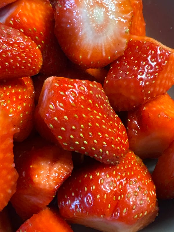 Fresh strawberries and pink drink photographed in Saint Petersburg