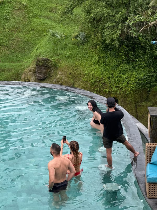 Tourists enjoy pools and swings at Tegallalang rice terraces