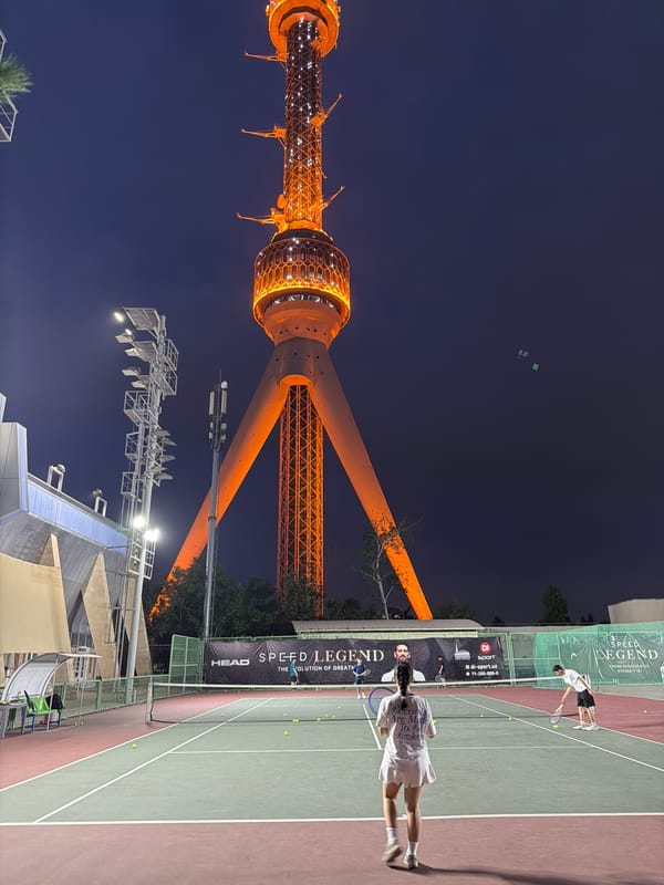 Evening tennis and tower views captured in Tashkent
