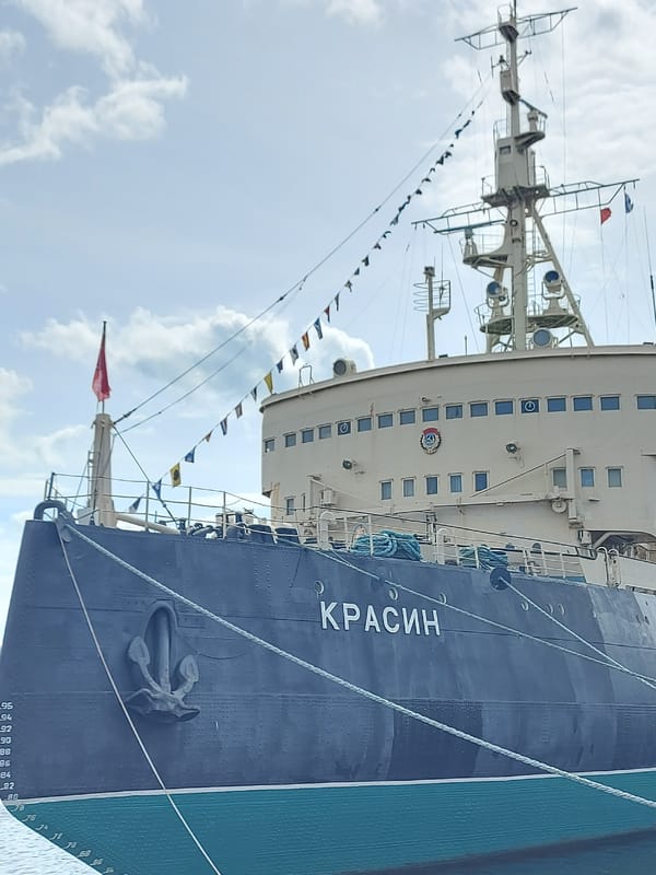 Routine sightseeing moments captured around Saint Petersburg's Krasin museum ship
