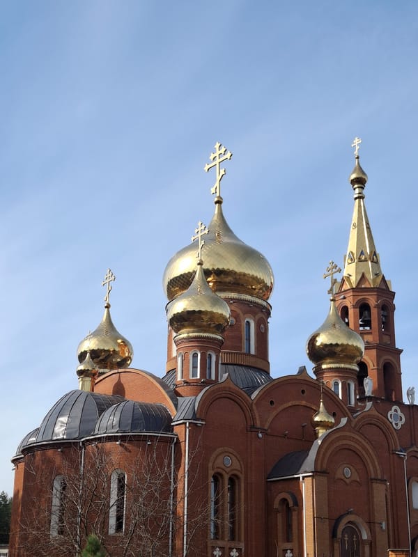 Orthodox cathedral with golden domes observed in Chaikovsky, Russia
