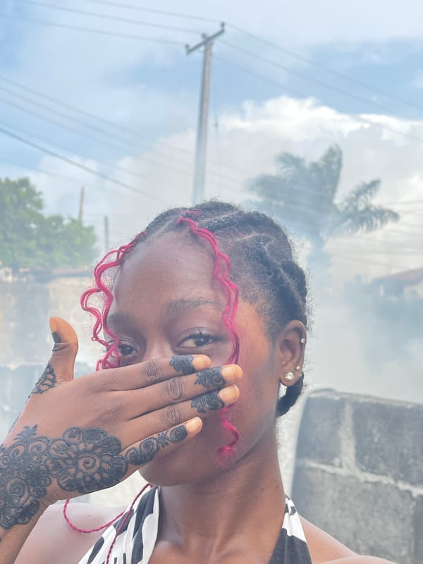 Woman poses for henna portrait session in Ado, Nigeria