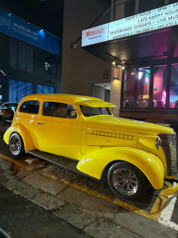 Yellow vintage car spotted on Cape Town street