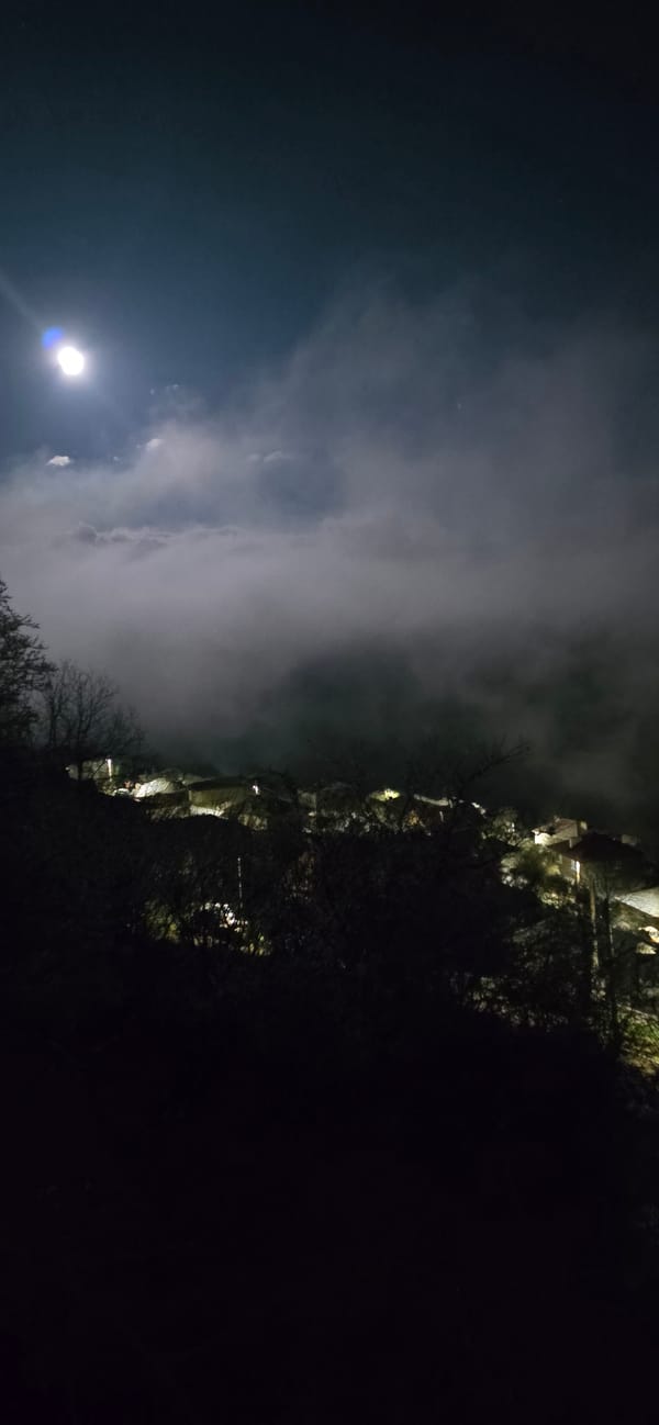 Bright moon observed through clouds in Breze, Bulgaria