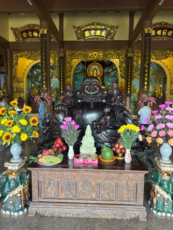 Buddhist temple altars in Da Nang, golden and wooden Buddhas