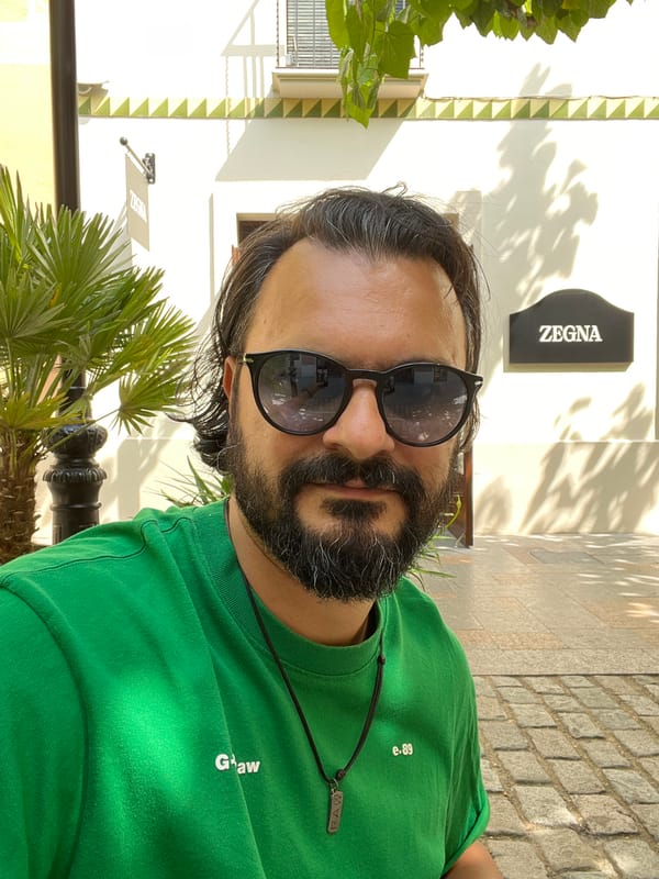 Man in green shirt spotted near Zegna store in Spain