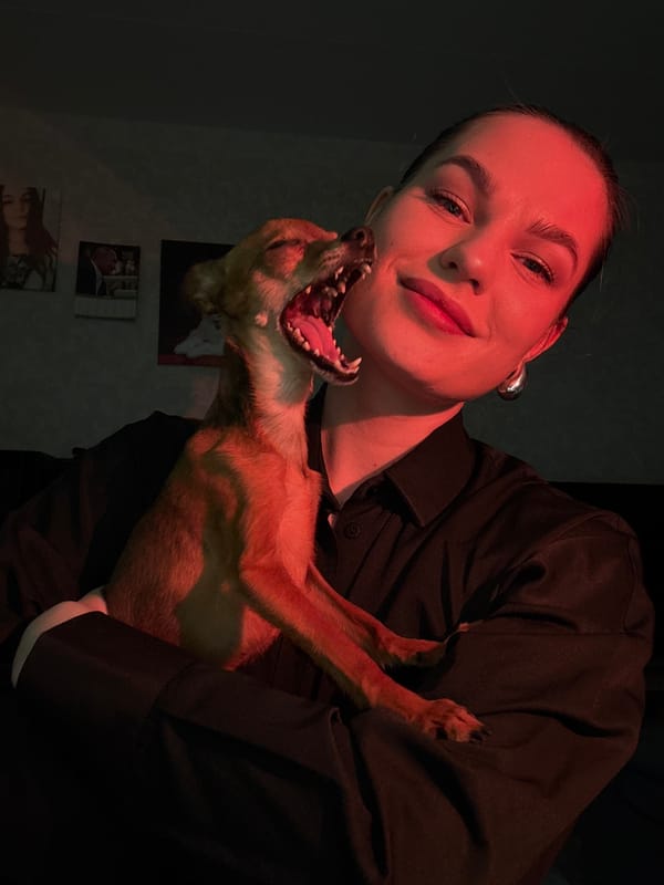 Woman documents evening routine with dog in Chaikovsky, Russia